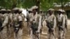 FILE - Chadian troops participate in the closing ceremony of operation Flintlock in an army base in N'Djamena, Chad, March 9, 2015. 