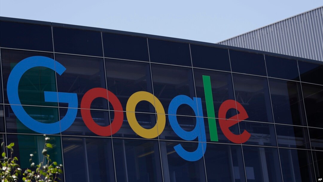 FILE - This July 19, 2016, file photo shows the Google logo at the company's headquarters in Mountain View, Calif. 