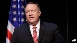 FILE - Secretary of State Mike Pompeo speaks at the Commonwealth Club in San Francisco, Jan. 13, 2020.