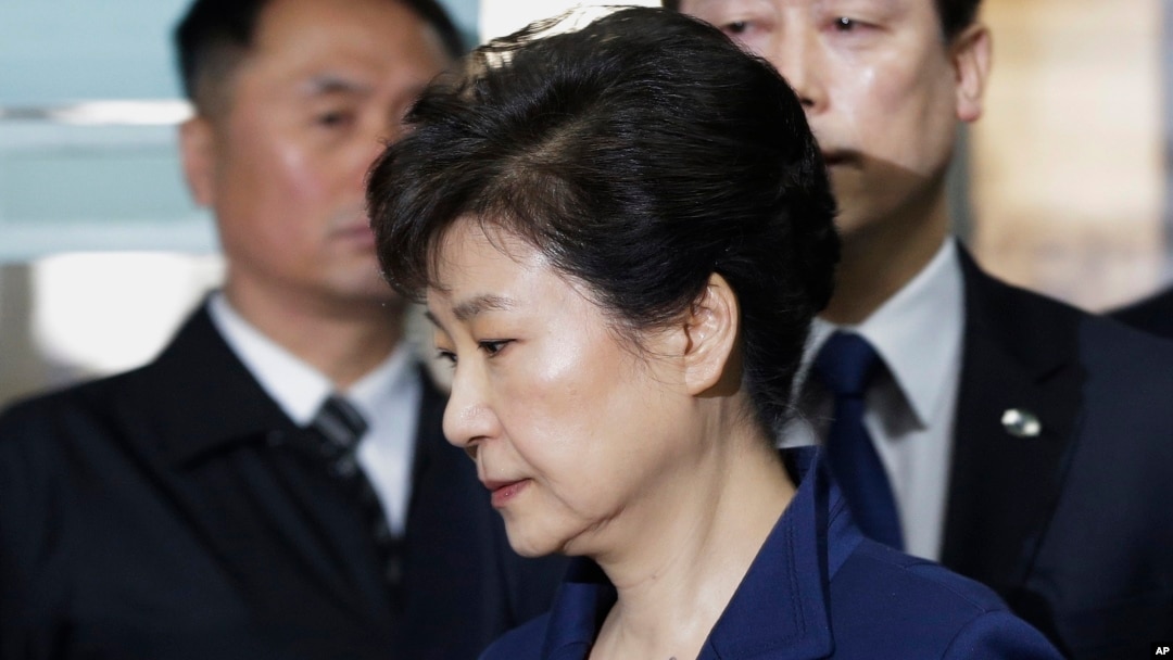 FILE - Ousted South Korean President Park Geun-hye arrives at the Seoul Central District Court for a hearing on a prosecutors' request for her arrest for corruption, in Seoul, South Korea, March 30, 2017.