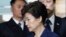 FILE - Ousted South Korean President Park Geun-hye arrives at the Seoul Central District Court for a hearing on a prosecutors' request for her arrest for corruption, in Seoul, South Korea, March 30, 2017.