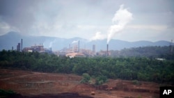 FILE —Steam rises from PT Vale Indonesia's nickel processing plant in Sorowako, South Sulawesi, Indonesia, September 12, 2023. Demand for critical minerals like nickel and cobalt is boosting carbon emissions by miners and processors of such materials. 