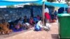 Some of the former workers camping at the GMB headquarters in Harare.