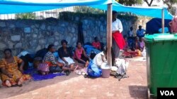 Some of the former workers camping at the GMB headquarters in Harare.