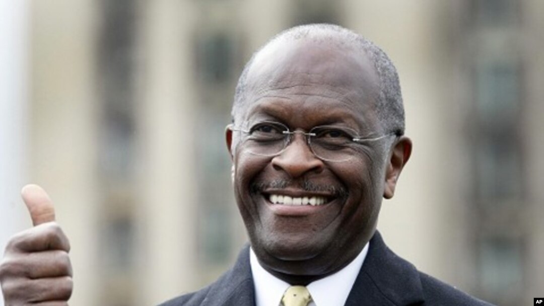 Republican Presidential candidate Herman Cain gestures to the crowd during a campaign stop in Detroit, Michigan (file photo)