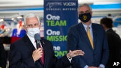 Vice President Mike Pence speaks during a visit to the General Motors/Ventec ventilator production facility with Indiana Gov. Eric Holcomb in Kokomo, Ind., April 30, 2020.