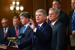 FILE - Rep. Michael McCaul, R-Texas, ranking member of the House Foreign Affairs Committee, center, speaks on the close of the war in Afghanistan, at the Capitol in Washington, Aug. 31, 2021.
