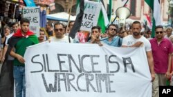 FILE - Participants of a pro-Palestinian rally are seen in Frankfurt, central Germany, July 20, 2014.