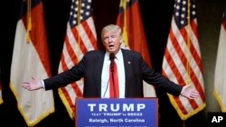 Republican Presidential candidate Donald Trump speaks at a rally in Raleigh, N.C., Tuesday, July 5, 2016. (AP Photo/Gerry Broome)