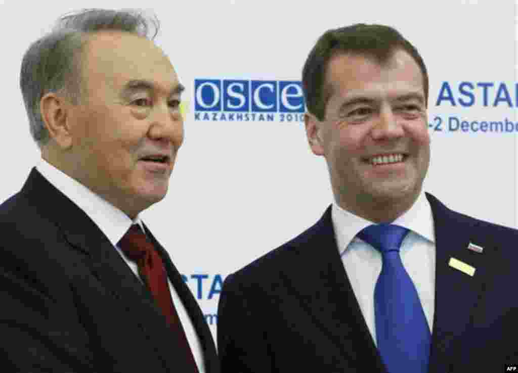 Russian President Dmitry Medvedev, right, and Kazakh President Nursultan Nazarbayev seen at the start of OSCE (Organisation for Security and Cooperation in Europe) meeting in Astana, Kazakhstan's capital, on Wednesday, Dec. 1, 2010. The group uniting th