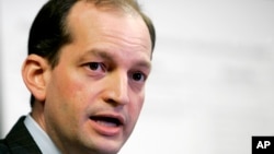 Alexander Acosta talks to reporters during a news conference in Miami, Jan. 16, 2008. President Donald Trump has chosen Acosta to be labor secretary.