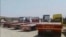 In this screen grab of a video verified by VOA Persian, trucks sit idle in the western Iranian city of Kangavar, May 29, 2018, as drivers participate in a nationwide truckers’ strike that began May 22.