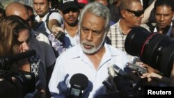 FILE- East Timor Prime Minister Xanana Gusmao speaks to reporters after voting in a polling station during parliamentary elections in Dili, July 7, 2012. 