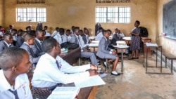 A teacher gives a lesson to his students at Wampewo Ntakke Secondary School in Kawempe tula village, Kampala, Uganda on Nov. 4, 2024. (AP Photo/Hajarah Nalwadda)