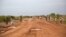 FILE - Civilians flee from renewed attacks in Bentiu, Unity state of South Sudan, April 20, 2014.