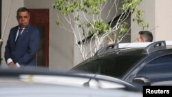 FILE - Jorge Picciani, the speaker of the Rio de Janeiro State Legislature arrives at the Federal Police headquarters in Rio de Janeiro, Brazil, March 29, 2017.