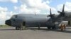 A Nigerian Air Force plane that will transport Nigerian refugees to Yola in Nigeria's Adamawa state waits in Maroua, Cameroon, Aug. 22, 2019. (Moki Kindzeka/VOA) 