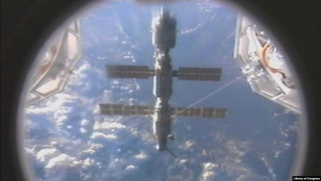 FILE - The International Space Station is pictured with the Earth in the background, Sept. 10, 2000.