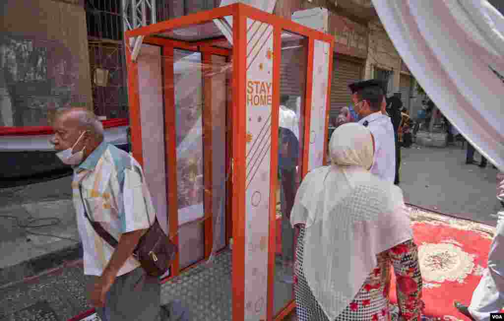 Some Egyptians worry that masks and sanitizers at the polls won’t be enough to prevent a resurgence of the virus in Cairo, Aug. 11, 2020.