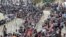 Rohingya refugees queue for aid at Cox's Bazar, Bangladesh, Sept. 26, 2017. 