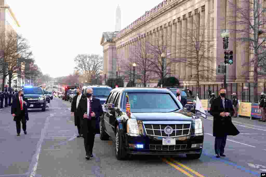 Vice President Kamala Harris, and her husband Doug Emhoff, ride during the Inauguration Day Parade Route in Washington after being sworn in as the 46th vice president of the United States.