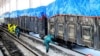 This undated picture released from North Korea's official Korean Central News Agency on March 4, 2020 shows workers disinfecting freight trains to prevent the spread of the COVID-19 coronavirus in Sinuiju, North Pyongan Province.