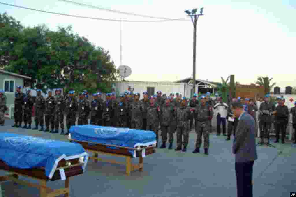 U.N. Secretary-General Ban Ki-moon pays respects to U.N. personnel who were killed in the massive earthquake in Haiti on 12 Jan 2010 - VOA Photo - Margaret Besheer