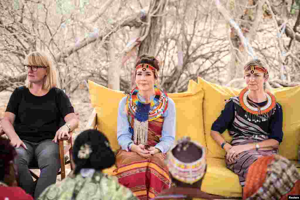 Danish Crown Princess Mary and Danish Minister for Development Ulla Toernaes meet with women from the local society at the Kalama Conservancy in Kalama, Kenya, Nov. 27, 2018.