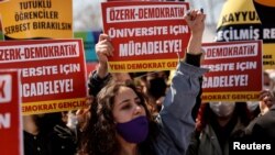 FILE - Students of Bogazici University rally against President Recep Tayyip Erdogan's appointment of a new rector for the school, in Istanbul, Turkey, March 27, 2021.