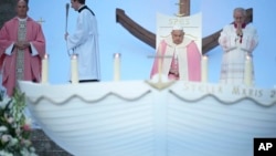 Pope Francis presides over a mass in Ajaccio "Place d'Austerlitz" during his visit in the French island of Corsica, Dec. 15, 2024.