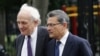 Former Goldman Sachs Group Inc. board member Rajat Gupta, right, and lawyer Gary Naftalis arrive at Manhattan Federal Court in New York, June 14, 2012.