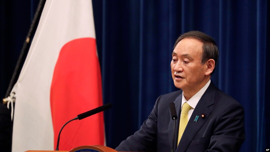 Perdana Menteri Jepang Yoshihide Suga berbicara saat konferensi pers di Tokyo pada hari Jumat, 4 Desember 2020. (Foto: AP)