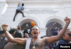 FILE PHOTO: Protest outside the office of Sri Lanka's PM Ranil Wickremesinghe, in Colombo