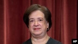 FILE - Associate Justice Elena Kagan sits with fellow Supreme Court justices for a group portrait at the Supreme Court Building in Washington, Nov. 30, 2018.