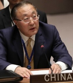 China's United Nations Ambassador Zhang Jun address a meeting of the United Nations Security Council on the Mideast, Aug. 20, 2019 at U.N. headquarters.