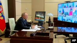 Ruski predsjednik Vladimir Putin na sastanku u Moskvi (Foto: Russian Presidential Press Service via AP)