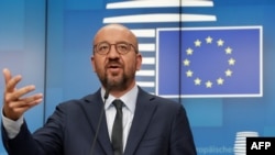 European Council President Charles Michel gestures as he speaks at a video press conference in Brussels, Belgium, Aug. 19, 2020.