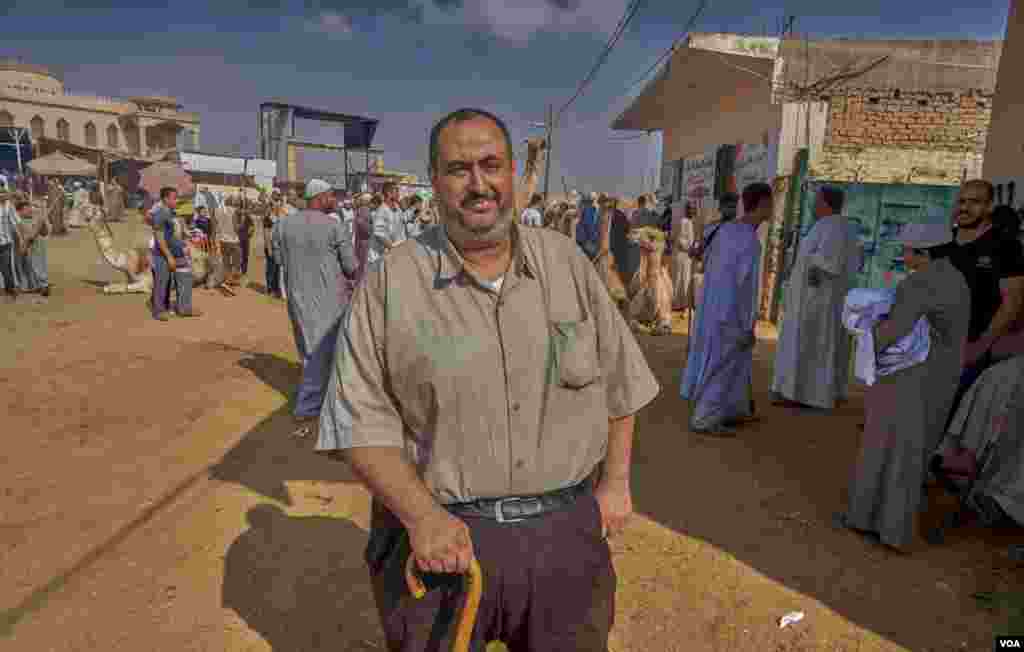 Camel is the meat of choice for many Egyptian Muslims at Eid. “I prefer camel meat because they have no sicknesses and are more tasty,” says Mohamed, 48, who came to Barqash to shop for a camel for the feast. (VOA/H. Elrasam)