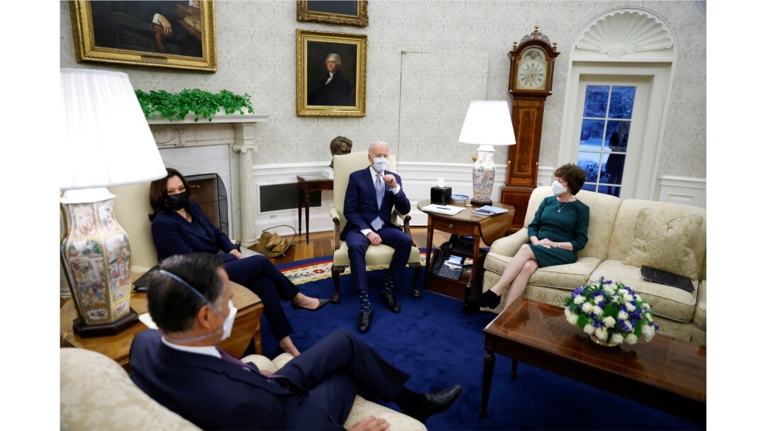 FILE - U.S. President Joe Biden and Vice President Kamala Harris meet with a group of Republican Senators to discuss coronavirus federal aid legislation inside the Oval Office at the White House, Feb. 1, 2021.