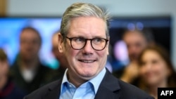 FILE - Britain's Prime Minister Keir Starmer reacts during a visit to a National Health Service (NHS) Healthcare Facility in east London, Oct. 21, 2024.