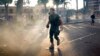 Peru’s Protest ‘Deactivators’ Run Toward Tear Gas to Stop It