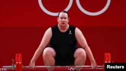 Laurel Hubbard of New Zealand competes in the women's +87kg weightlifting event at the 2020 Summer Olympics, in Tokyo, Japan, Aug. 2, 2021.
