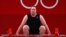 Laurel Hubbard of New Zealand competes in the women's +87kg weightlifting event at the 2020 Summer Olympics, in Tokyo, Japan, Aug. 2, 2021.