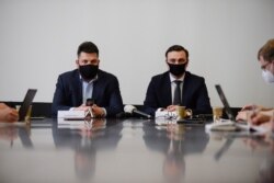Leonid Volkov, Chief of Staff for Russian opposition leader Alexey Navalny, and Ivan Zhdanov, director of the Anti-Corruption Foundation, hold a press conference in Brussels, Belgium, Feb. 22, 2021.