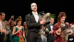 "The Phantom of the Opera" cast on stage after the final performance of the famous Broadway show in New York City, on April 16, 2023. (Photo by Charles Sykes/Invision/AP)