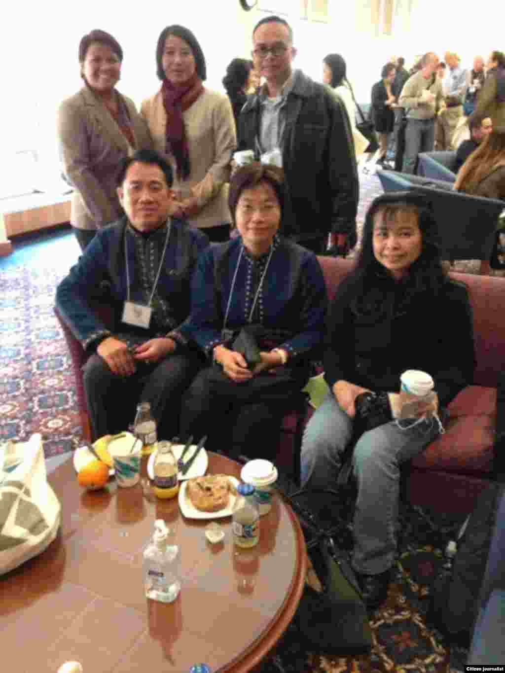 Unmarked military vehicles burn on a country road in the village of Berezove, eastern Ukraine, after a clash between pro-government troops and Russian-backed separatist militia.