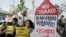 South Korean protesters shout slogans during a rally to oppose a plan to deploy an advanced U.S. missile defense system called Terminal High-Altitude Area Defense, or THAAD, near the U.S. Embassy in Seoul, South Korea, Oct. 20, 2016.