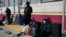 Asylum-seekers with appointments made done  the U.S. Customs and Border Protection CBP One exertion  hold   astatine  the entranceway  of the Camino Real International Bridge successful  Piedras Negras, Coahuila, Mexico, Jan. 20, 2025.