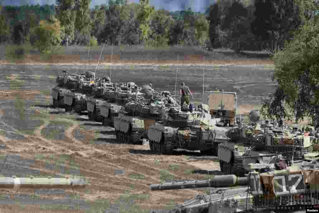 Israeli armored vehicles at a staging area near the border with Gaza Strip August 4, 2014.