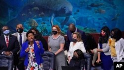 File - Florida Rep.Tracie Davis, left foreground, speaks during a legislative session, April 28, 2021, as lawmakers were poised to finalize new rules on voting by mail and tighten ID requirements for routine voter registration.